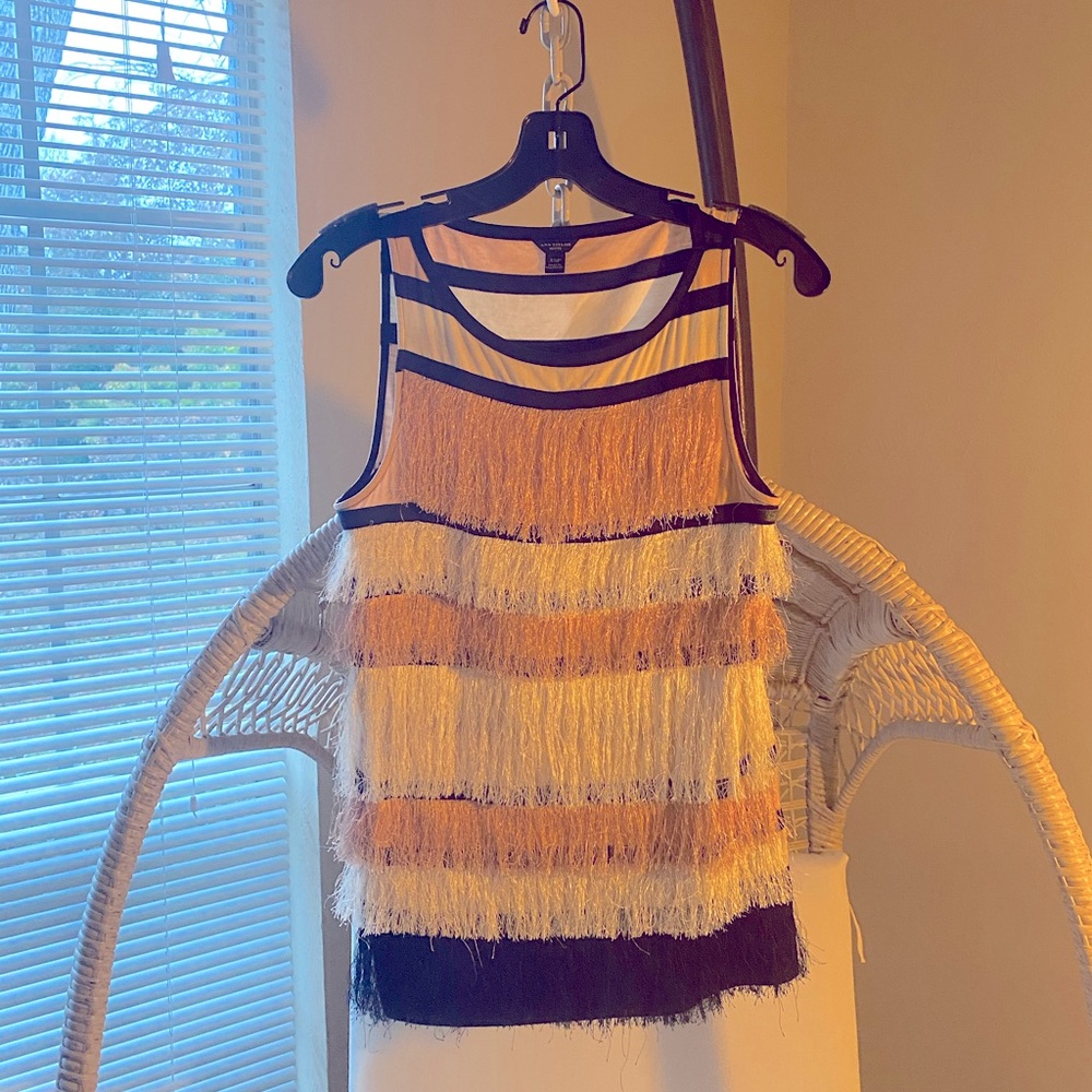 Fun sleeveless blouse.